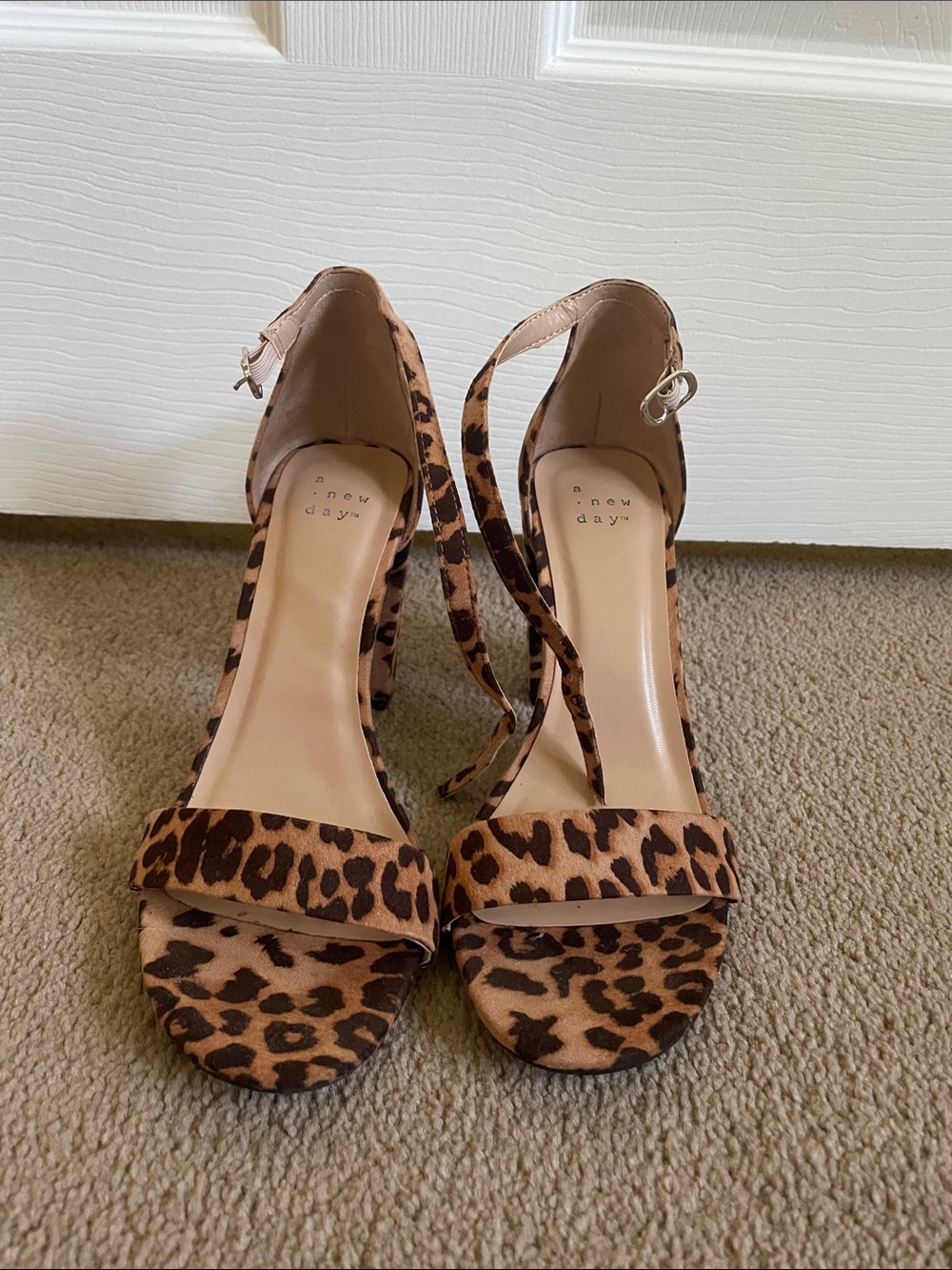 Cheetah print strappy heels, size 7.5